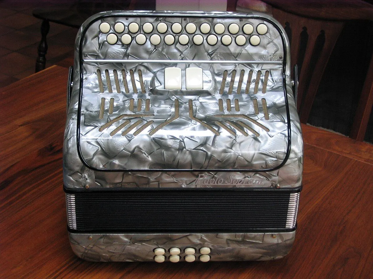 Two-row melodeon with bellows and buttons
