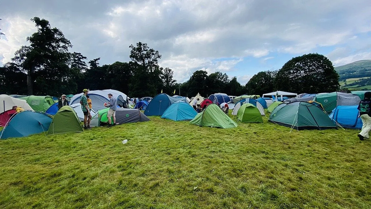 Family with young children at a festival campsite