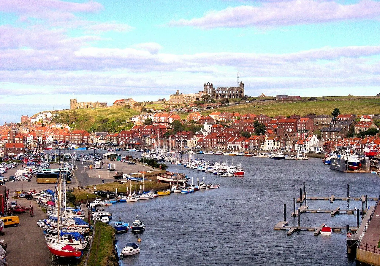 Folk dancers performing on a street in Whitby